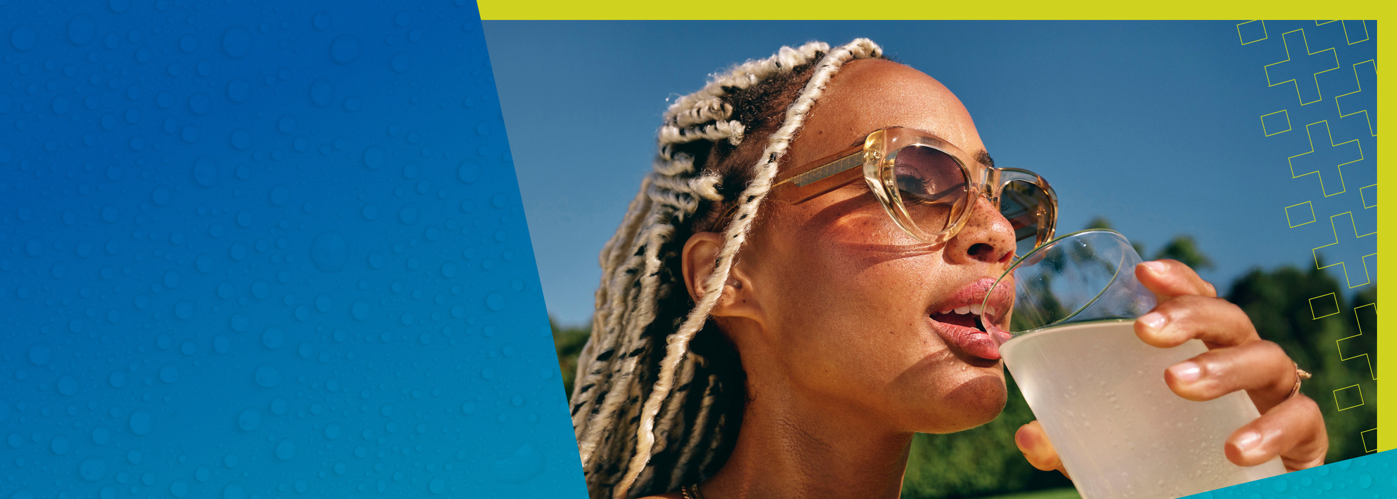 Women with sunglasses drinking liquid iv hydration multiplier